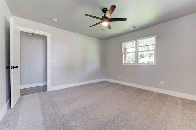 1317 E Boyd St, Norman, OK 73071 - carpeted empty room with a ceiling fan and a smoke detector