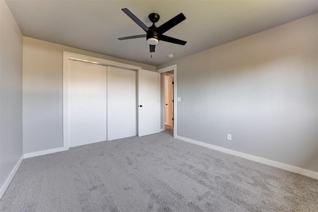 1317 E Boyd St, Norman, OK 73071 - unfurnished bedroom with carpet floors, a closet, and ceiling fan