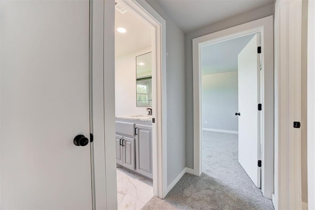 1317 E Boyd St, Norman, OK 73071 - hallway with baseboards and light carpet