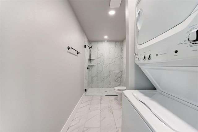 1317 E Boyd St, Norman, OK 73071 - bathroom with marble look tiles, stacked washer / drying machine, a marble finish shower, and recessed lighting