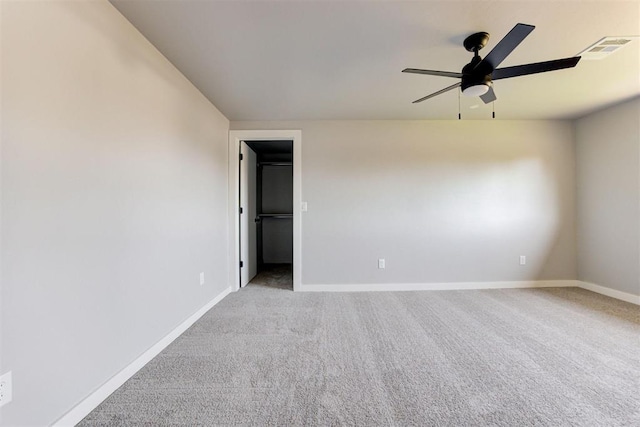 1317 E Boyd St, Norman, OK 73071 - spare room featuring a ceiling fan and light colored carpet