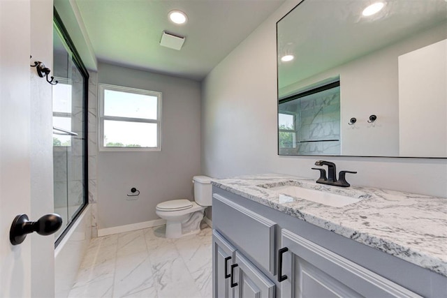 1317 E Boyd St, Norman, OK 73071 - full bathroom featuring vanity, marble finish floors, recessed lighting, and combined bath / shower with glass door