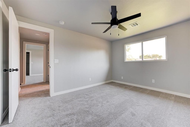 1317 E Boyd St, Norman, OK 73071 - unfurnished room with carpet flooring, a ceiling fan, and a smoke detector