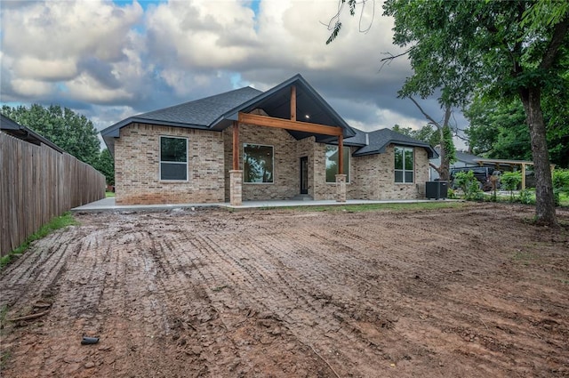 2705 NW 40th St, Oklahoma City, OK 73112 - view of front of property featuring brick siding and a shingled roof