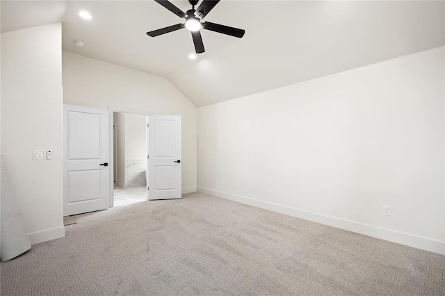 2705 NW 40th St, Oklahoma City, OK 73112 - unfurnished bedroom featuring vaulted ceiling, light colored carpet, recessed lighting, and ceiling fan