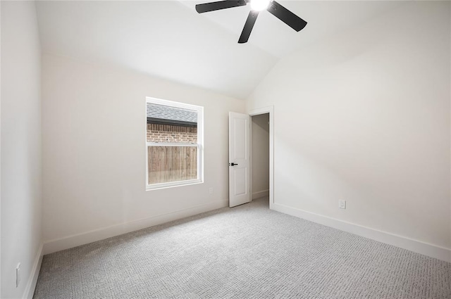 2705 NW 40th St, Oklahoma City, OK 73112 - spare room featuring a ceiling fan, light carpet, and vaulted ceiling