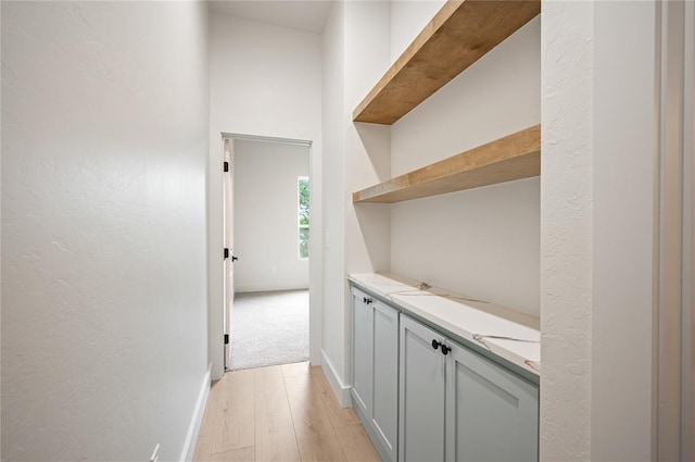 2705 NW 40th St, Oklahoma City, OK 73112 - hall with light wood-type flooring and a textured wall