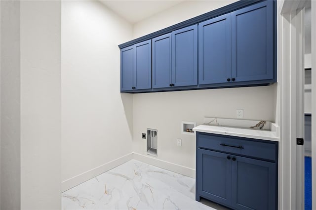 2705 NW 40th St, Oklahoma City, OK 73112 - laundry room featuring cabinet space, hookup for a washing machine, light marble finish flooring, and electric dryer hookup