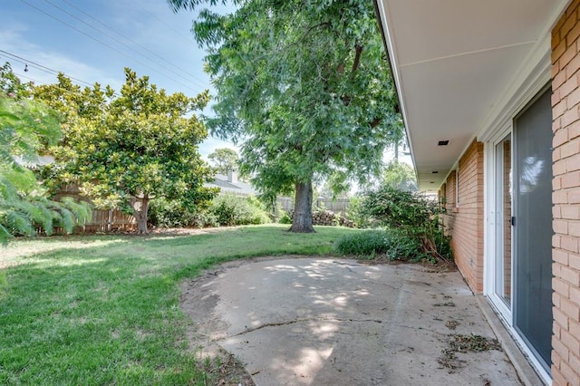 3325 NW 65th St Unit 4057723241, Oklahoma City, OK 73116 - view of yard featuring a patio area