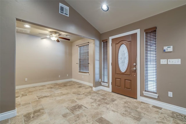 6704 Tall Oaks Dr, Oklahoma City, OK 73127 - foyer entrance with stone finish flooring, ceiling fan, and vaulted ceiling