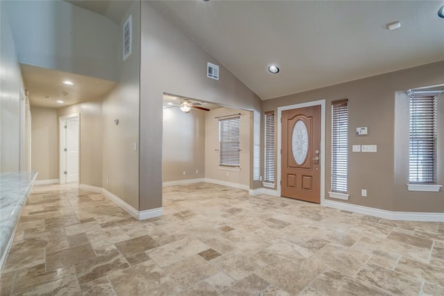 6704 Tall Oaks Dr, Oklahoma City, OK 73127 - entrance foyer with stone tile flooring, high vaulted ceiling, a ceiling fan, and recessed lighting