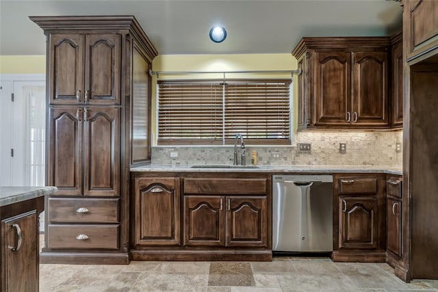 6704 Tall Oaks Dr, Oklahoma City, OK 73127 - kitchen with dishwasher, dark brown cabinetry, backsplash, light stone counters, and light stone finish flooring