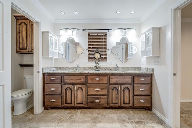 6704 Tall Oaks Dr, Oklahoma City, OK 73127 - bathroom with double vanity, crown molding, and stone finish flooring