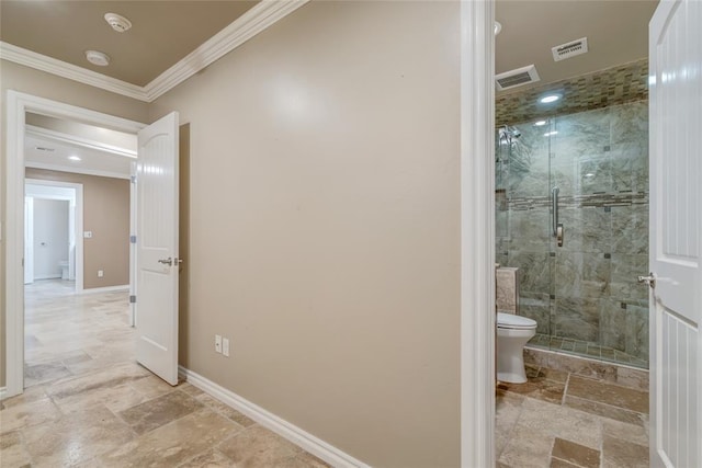 6704 Tall Oaks Dr, Oklahoma City, OK 73127 - hall with crown molding and stone tile floors
