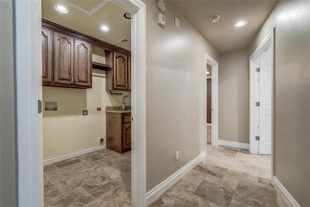 6704 Tall Oaks Dr, Oklahoma City, OK 73127 - corridor with light stone finish flooring and recessed lighting