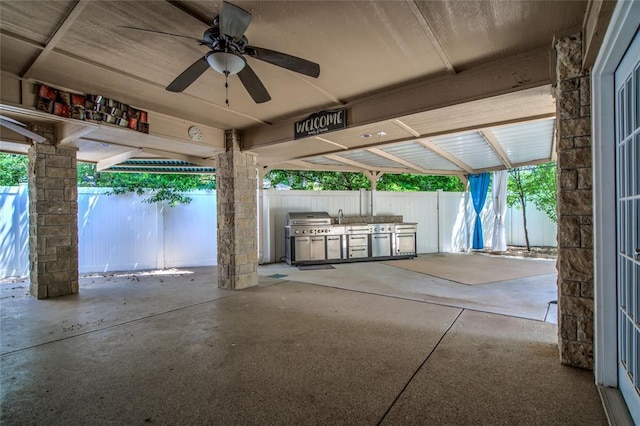 6704 Tall Oaks Dr, Oklahoma City, OK 73127 - fenced backyard featuring area for grilling, a patio area, and a ceiling fan