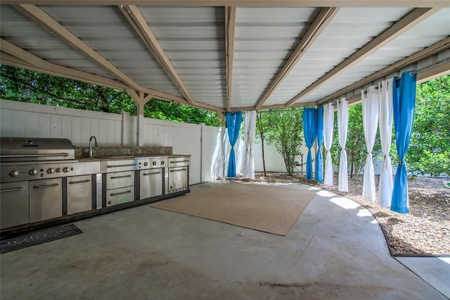 6704 Tall Oaks Dr, Oklahoma City, OK 73127 - view of patio with exterior kitchen and a sink