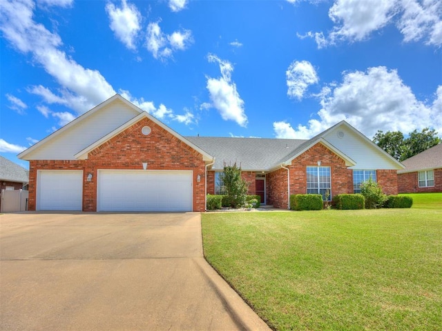 1405 Cambridge Ct, Shawnee, OK 74804 - traditional-style house featuring concrete driveway, brick siding, an attached garage, and a front yard