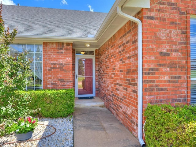 1405 Cambridge Ct, Shawnee, OK 74804 - entrance to property with brick siding and a shingled roof