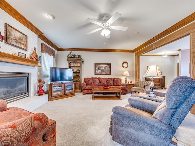1405 Cambridge Ct, Shawnee, OK 74804 - living area with crown molding, carpet floors, a brick fireplace, and ceiling fan