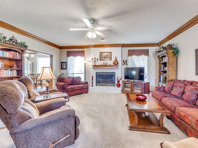 1405 Cambridge Ct, Shawnee, OK 74804 - carpeted living room featuring crown molding, a brick fireplace, a ceiling fan, and a chandelier