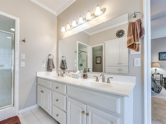 1405 Cambridge Ct, Shawnee, OK 74804 - bathroom featuring double vanity, a tile shower, tile patterned flooring, and crown molding
