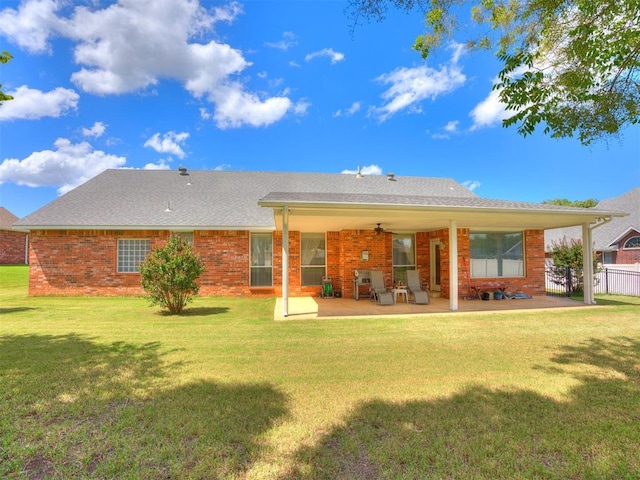 1405 Cambridge Ct, Shawnee, OK 74804 - rear view of house with a patio, brick siding, and ceiling fan