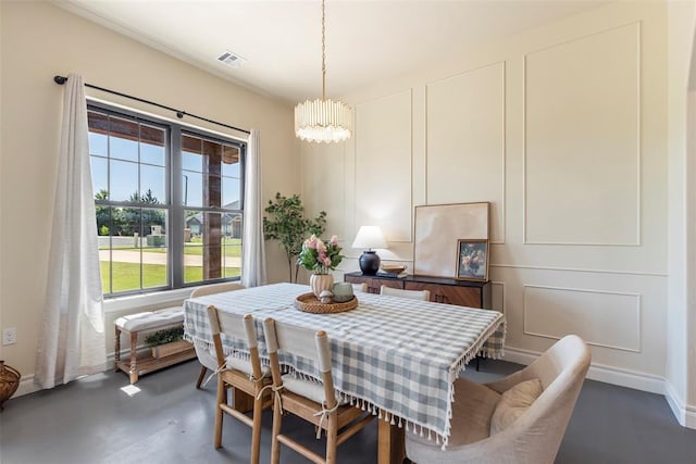 1074 Fawn Meadow Dr, Blanchard, OK 73010 - dining room with a chandelier and a decorative wall