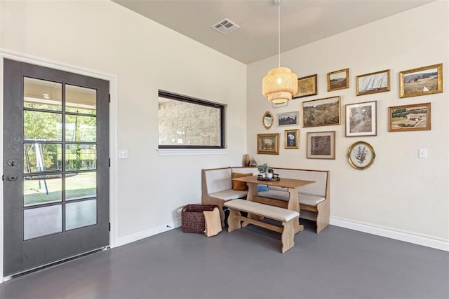 1074 Fawn Meadow Dr, Blanchard, OK 73010 - dining room with baseboards and finished concrete flooring