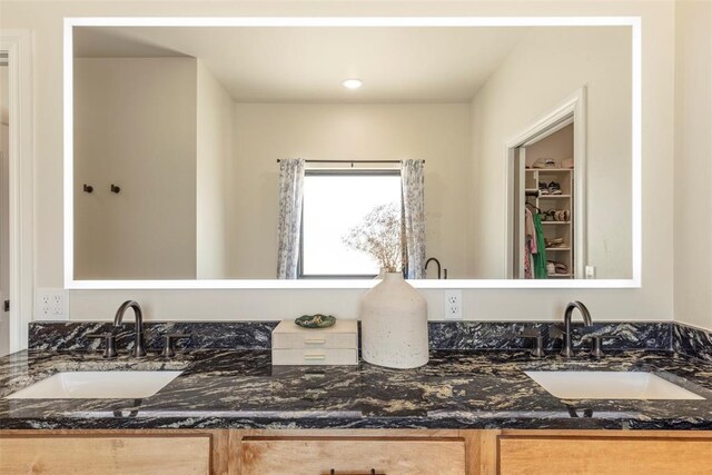 1074 Fawn Meadow Dr, Blanchard, OK 73010 - full bathroom featuring double vanity and a walk in closet