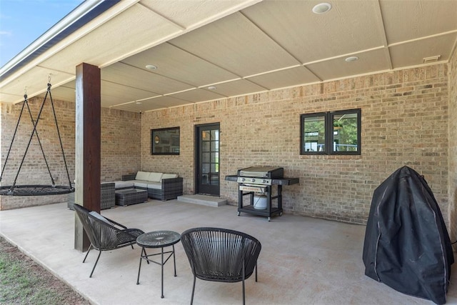 1074 Fawn Meadow Dr, Blanchard, OK 73010 - view of patio / terrace featuring outdoor lounge area and area for grilling