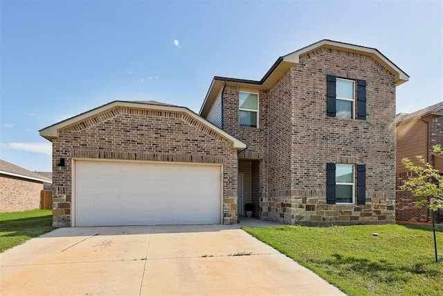10409 NW 25th St, Yukon, OK 73099 - traditional-style home with brick siding, an attached garage, concrete driveway, a front yard, and stone siding