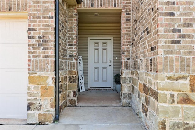 10409 NW 25th St, Yukon, OK 73099 - view of exterior entry with brick siding