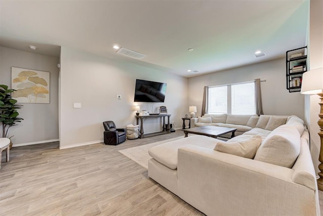 10409 NW 25th St, Yukon, OK 73099 - living room with light wood-style flooring and recessed lighting