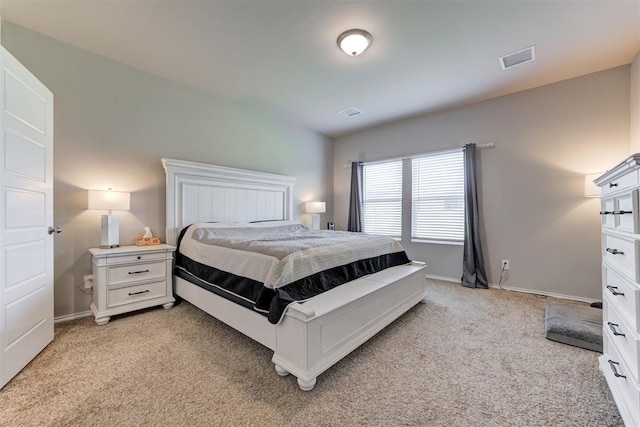 10409 NW 25th St, Yukon, OK 73099 - bedroom featuring light colored carpet and baseboards