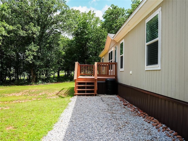 16940 Wildwood Dr, Lexington, OK 73051 - view of green lawn featuring a deck