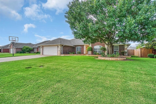 517 N Quail Run, Altus, OK 73521 - ranch-style home with an attached garage, driveway, and brick siding