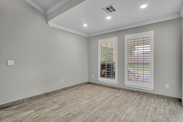 517 N Quail Run, Altus, OK 73521 - empty room with crown molding, light wood-style floors, and recessed lighting