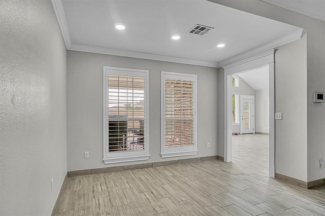 517 N Quail Run, Altus, OK 73521 - empty room featuring ornamental molding, wood tiled floors, and recessed lighting