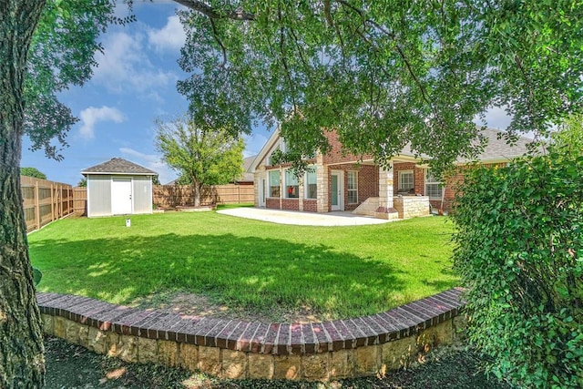 517 N Quail Run, Altus, OK 73521 - fenced backyard with a storage unit and a patio area