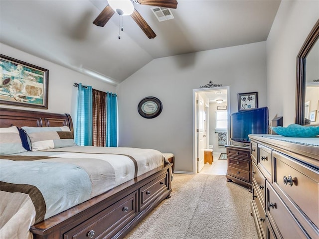18204 Summer Grove Ave, Edmond, OK 73012 - bedroom with vaulted ceiling, ensuite bathroom, light colored carpet, and ceiling fan