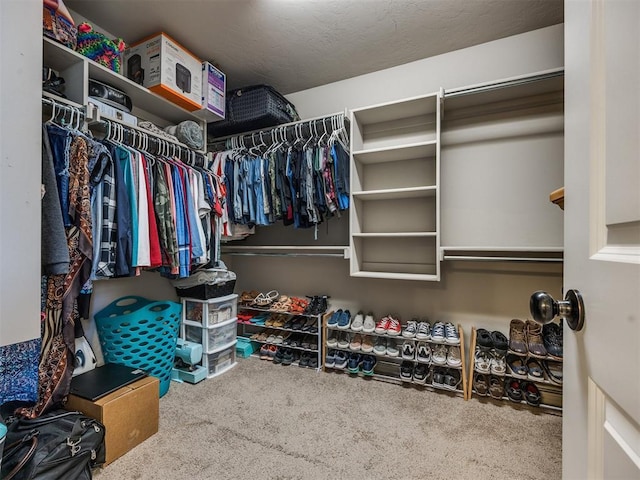 18204 Summer Grove Ave, Edmond, OK 73012 - walk in closet featuring carpet flooring