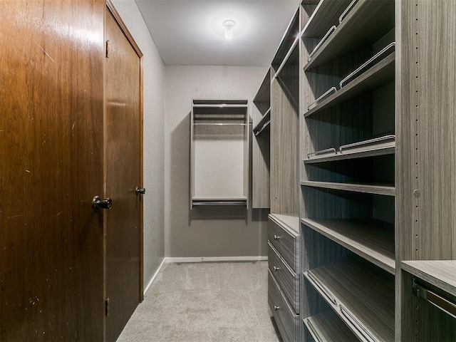 2004 Tanglewood Dr, Edmond, OK 73013 - walk in closet featuring carpet
