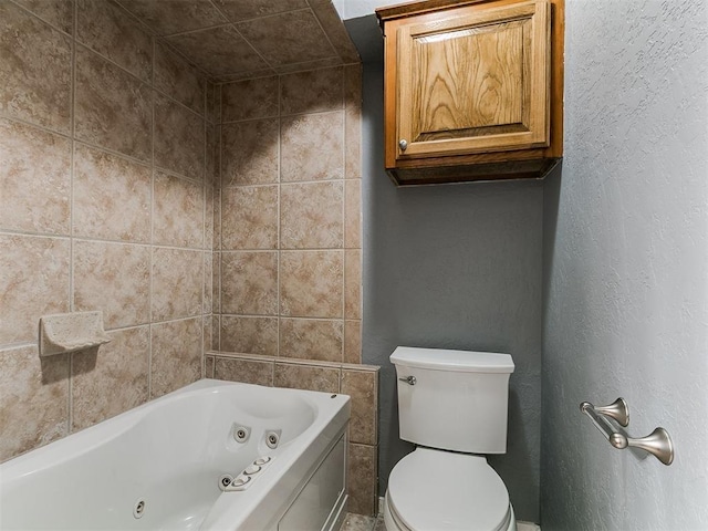 2004 Tanglewood Dr, Edmond, OK 73013 - full bathroom featuring a tub with jets and a textured wall