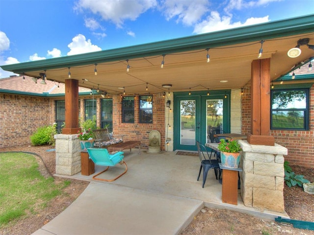 1616 E Cottonwood Rd, Goldsby, OK 73093 - view of patio featuring french doors