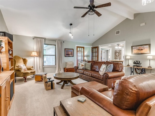 1616 E Cottonwood Rd, Goldsby, OK 73093 - carpeted living room with ceiling fan, beam ceiling, and high vaulted ceiling