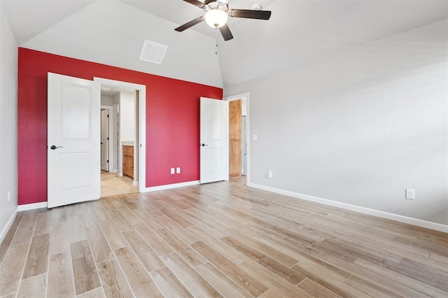 9233 NW 91st St, Yukon, OK 73099 - unfurnished bedroom featuring light wood-style floors, ceiling fan, connected bathroom, and high vaulted ceiling