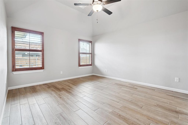 9233 NW 91st St, Yukon, OK 73099 - unfurnished room featuring light wood-style flooring, vaulted ceiling, and ceiling fan