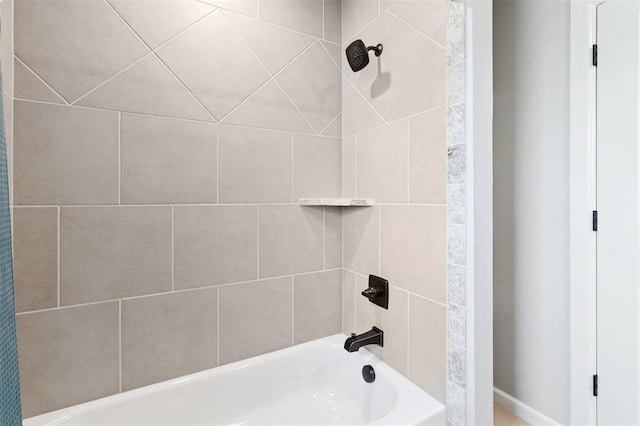 9233 NW 91st St, Yukon, OK 73099 - full bathroom featuring washtub / shower combination and baseboards