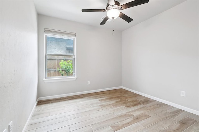 9233 NW 91st St, Yukon, OK 73099 - empty room featuring light wood-style floors and ceiling fan
